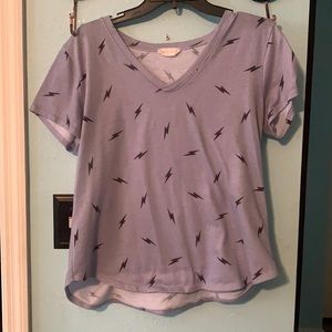 Bluish gray v-neck tee with lightning bolts